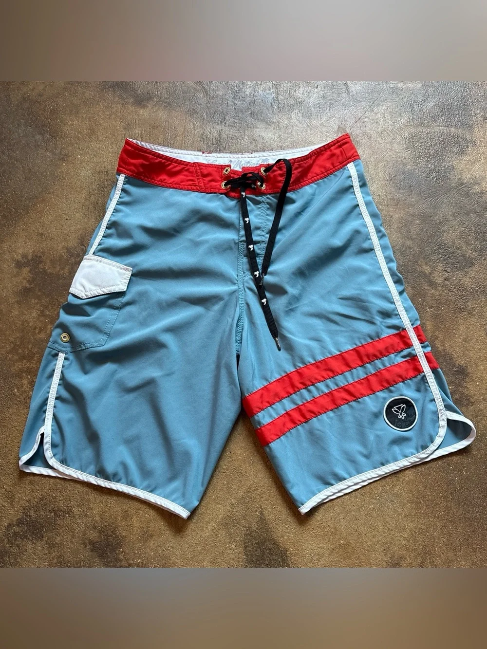 Men's Light Blue Swim Shorts with Red Accents